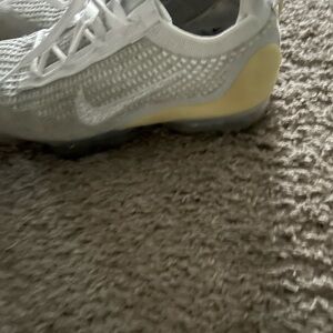 Nike women’s White and Cream Sneakers